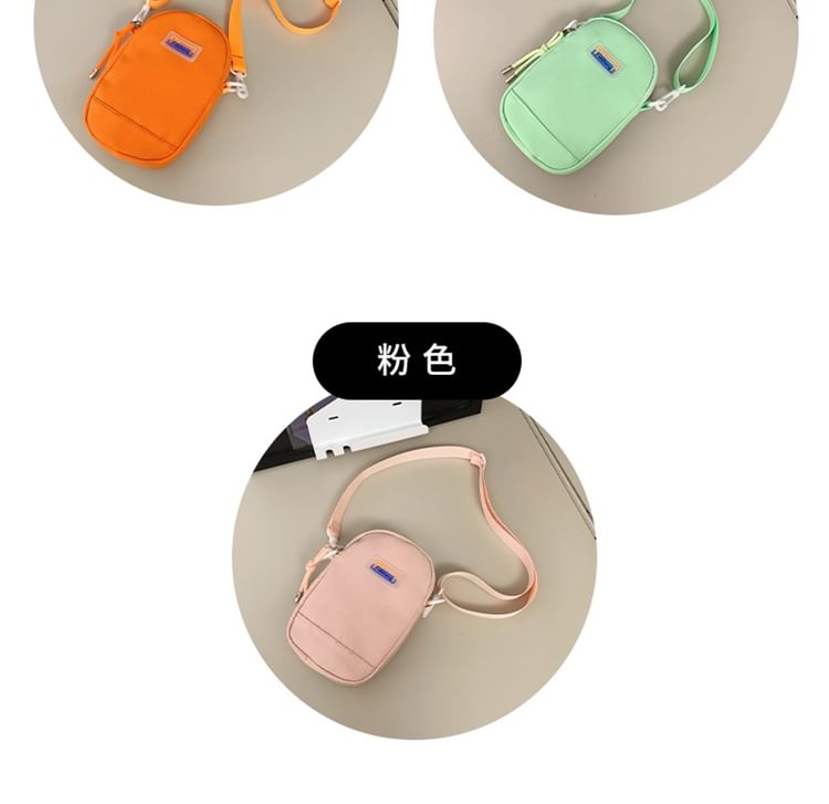 IOU - Nylon crossbodytas met applicaties