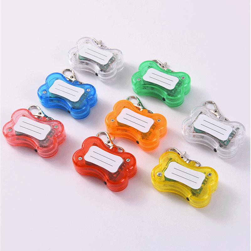 (45x30mm) LED Hunde Sicherheitslicht Knochen Leucht Anhänger für Halsband / Leine inkl. LR44 Batterien - Rot