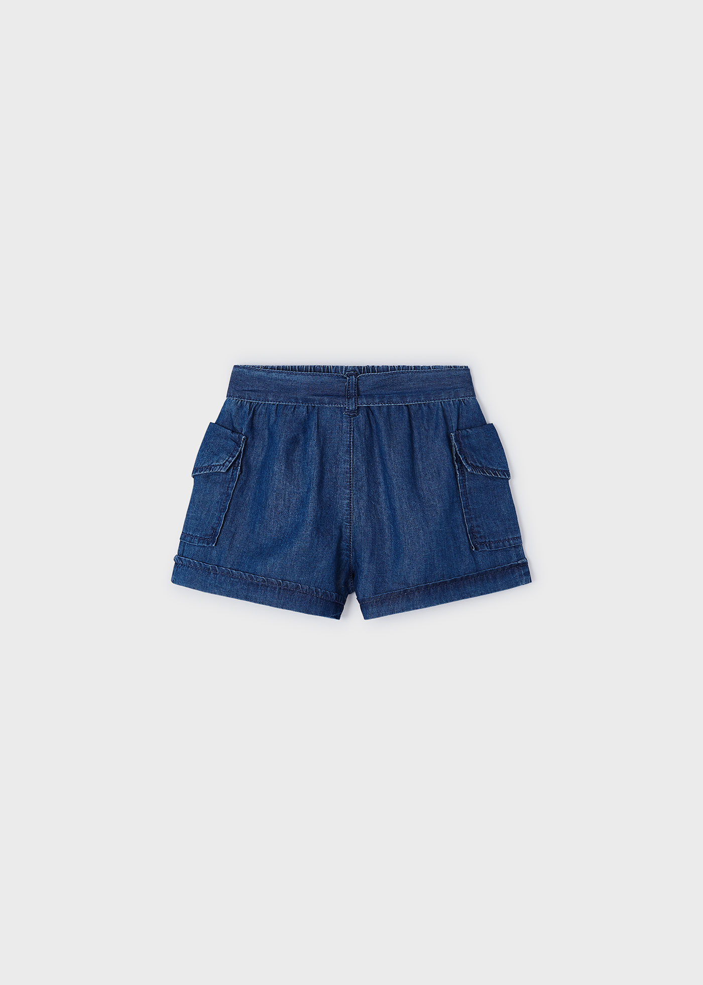 Calções para menina com bolsos, em ganga escura.