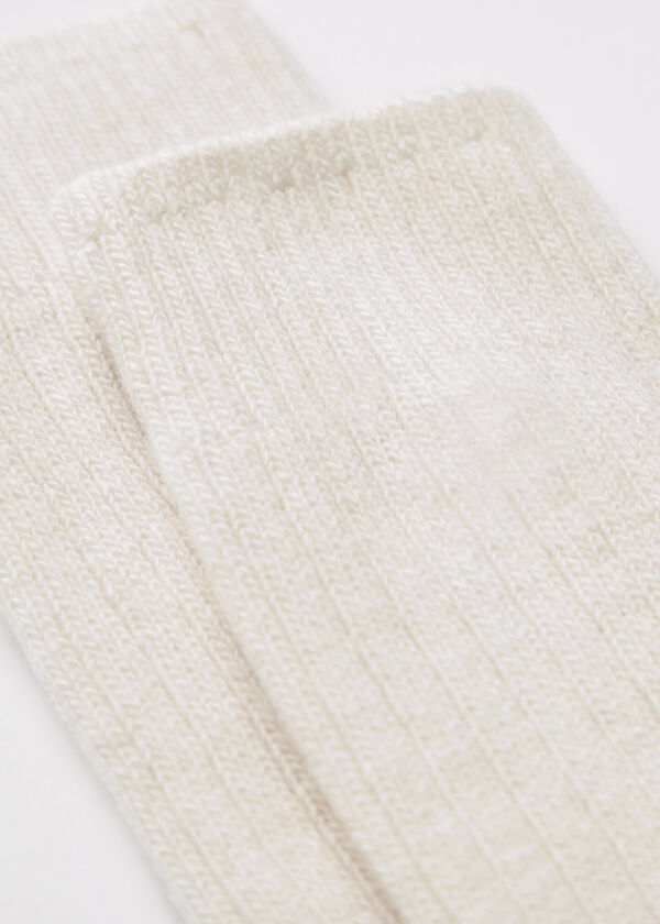 Meias compridas caneladas femininas em lã e cashmere.