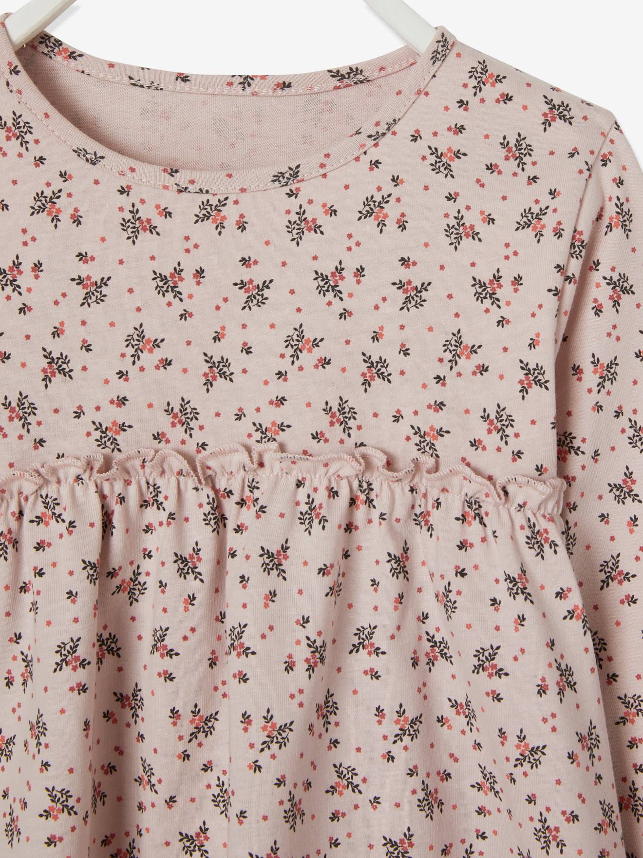 Blusa rosa claro com estampa floral para meninas.
