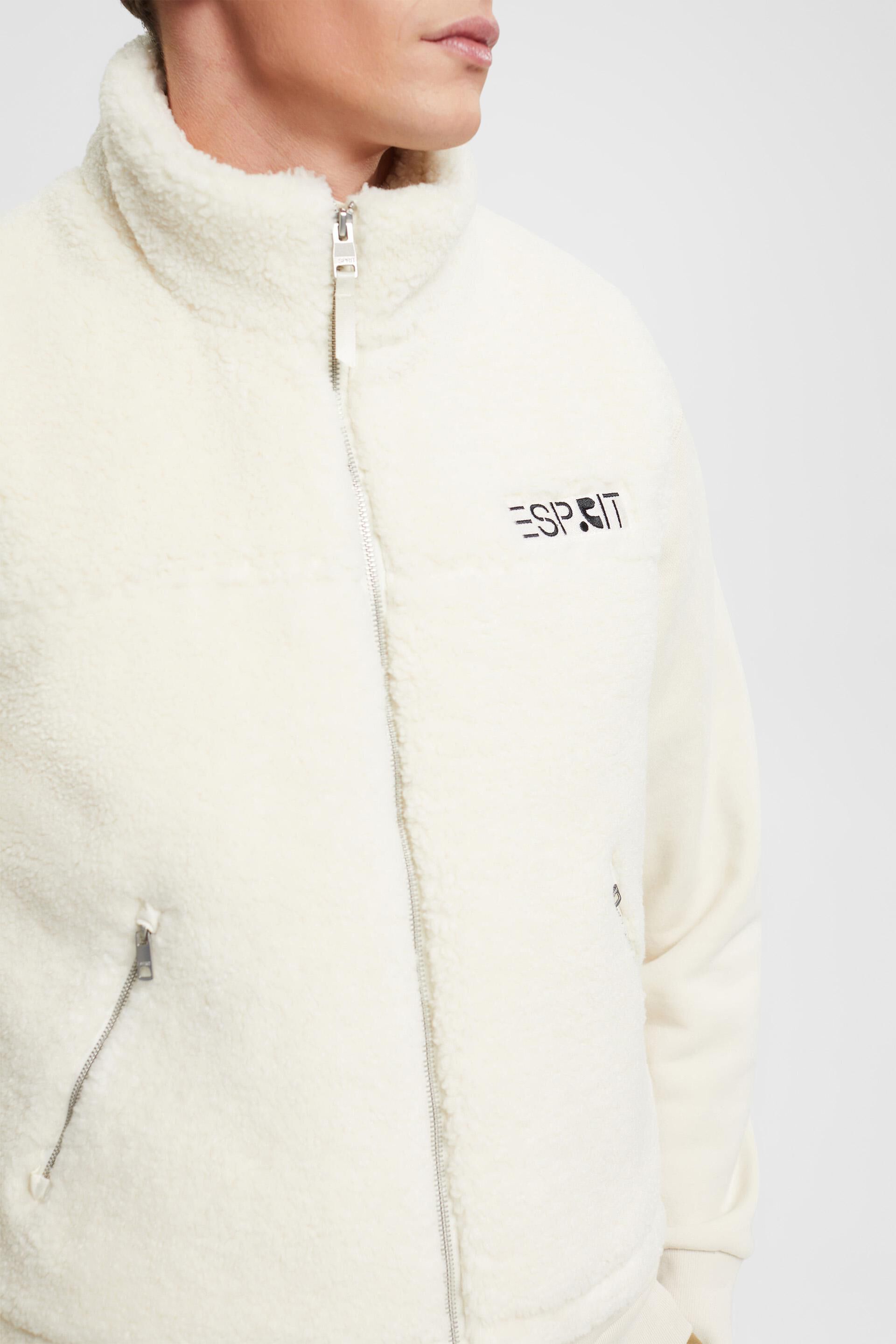 Veste sans manches en borgana d’aspect peluche ornée d’un logo brodé