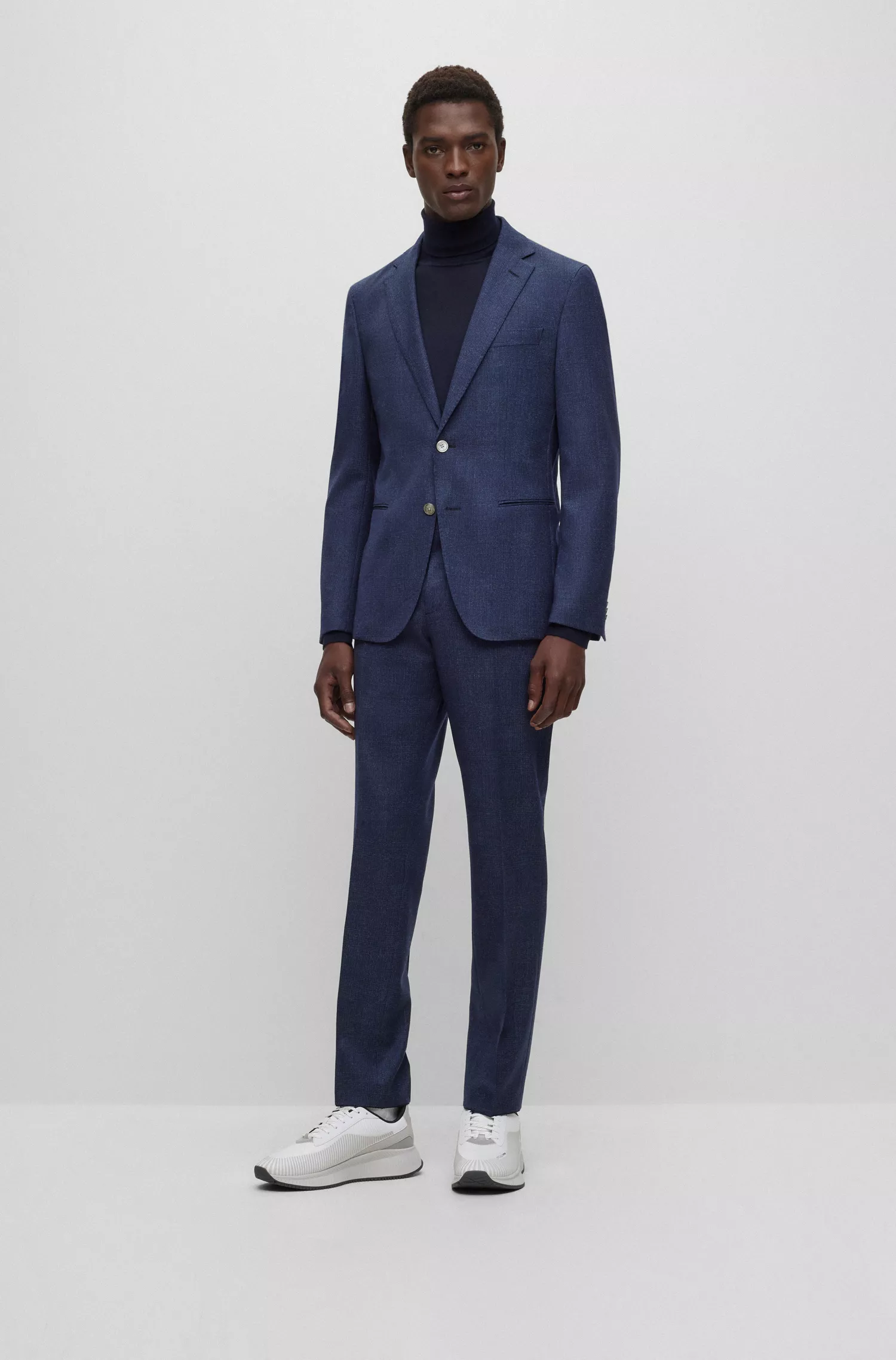 Terno BOSS preto slim fit em lã elástica xadrez.