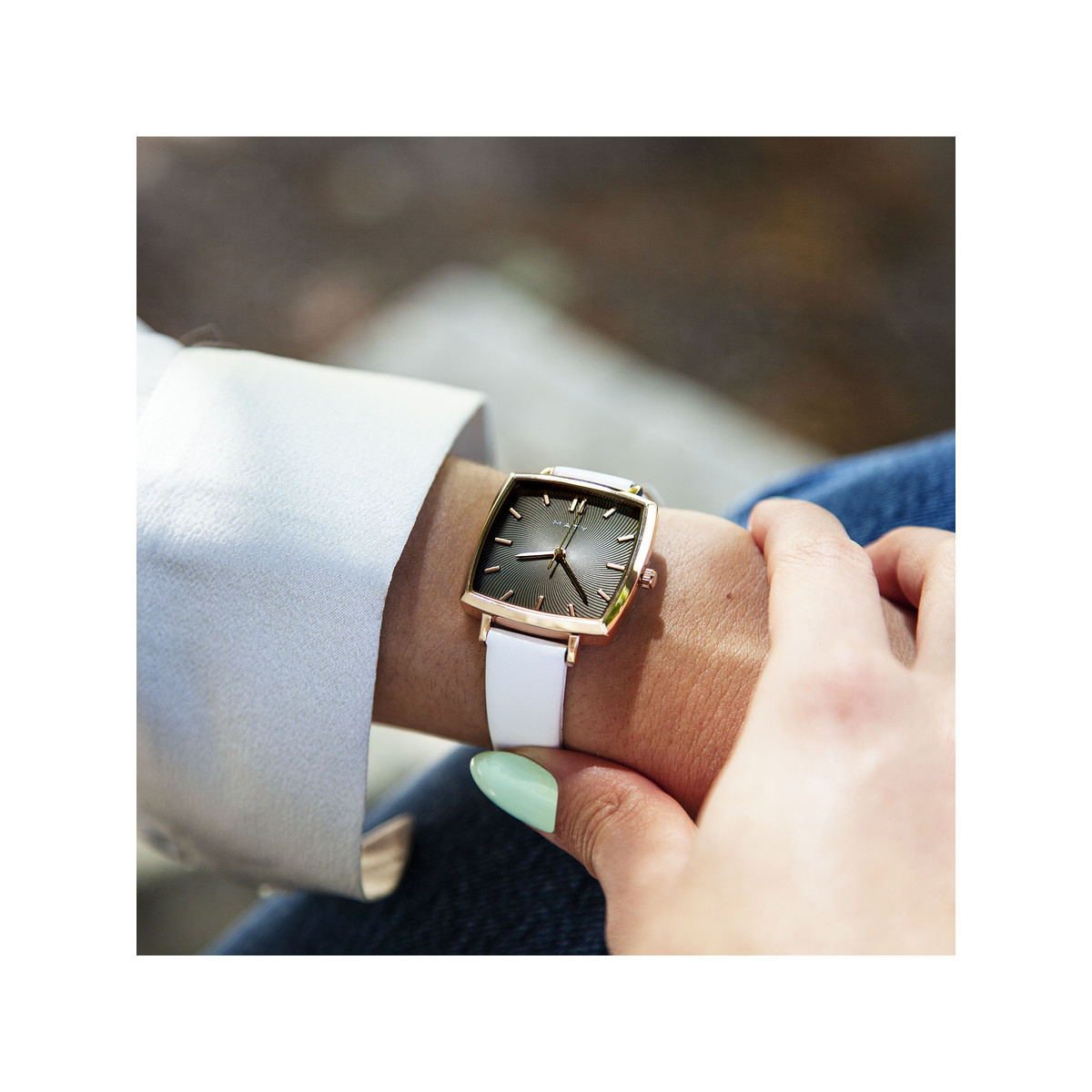 Montre dorée rose cuir blanc
