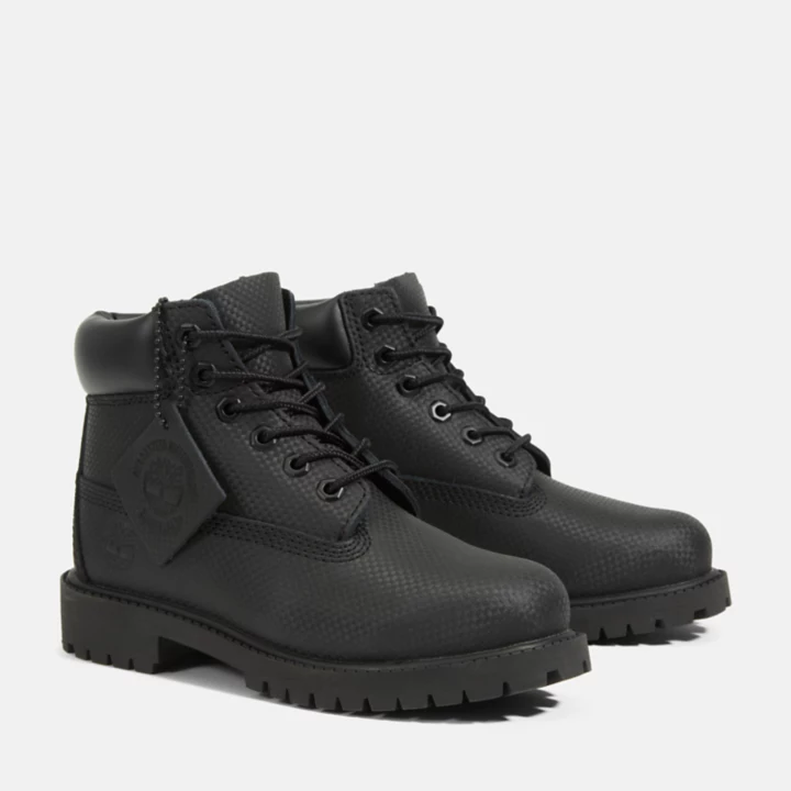Bota Timberland Premium Helcor de 6 polegadas para jovens na cor preta.