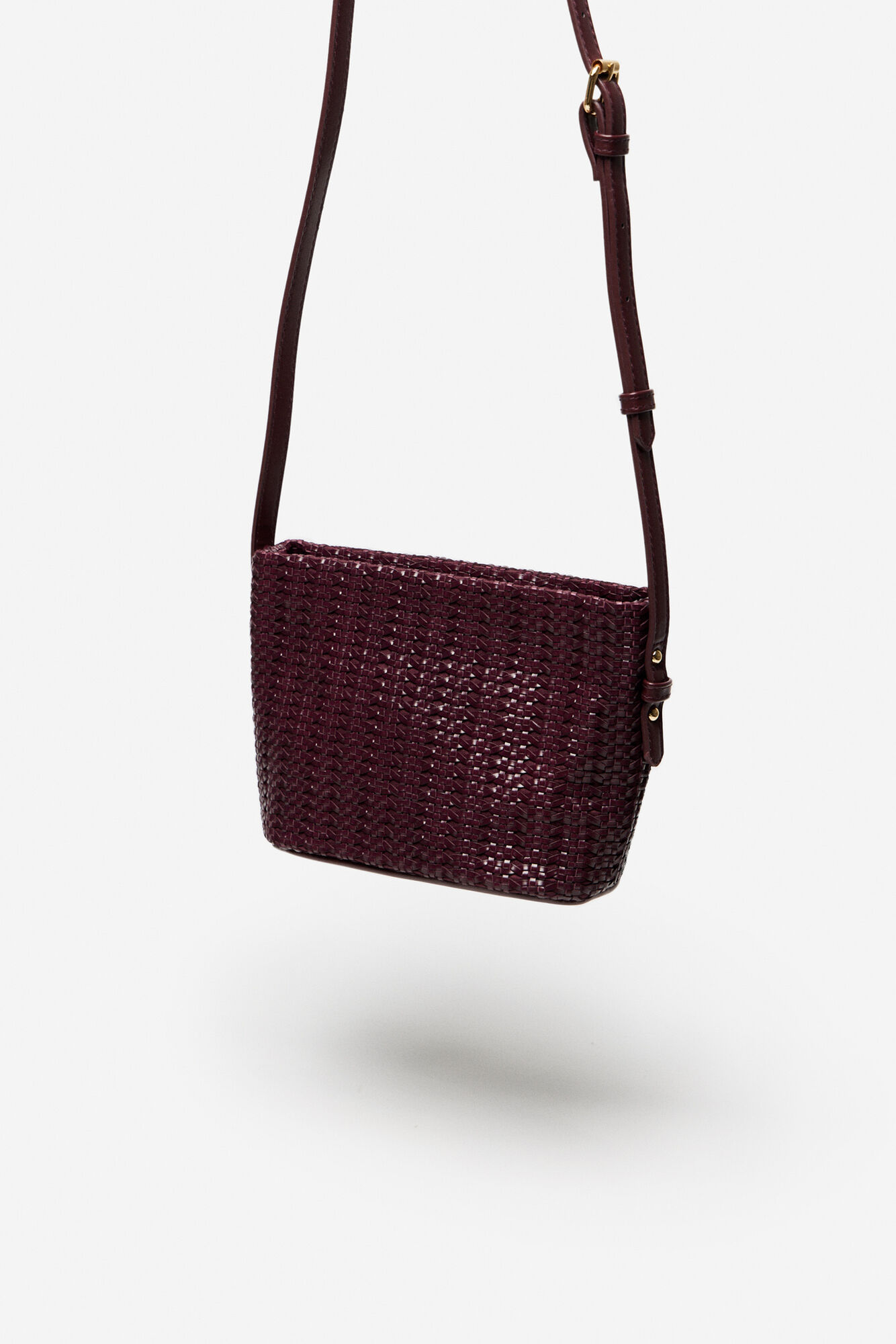 Bolsa de ombro trançada