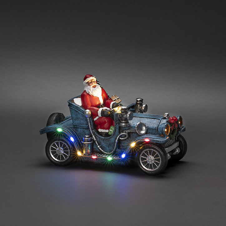 Figurine Père Noël en voiture 11 LED 16 cm