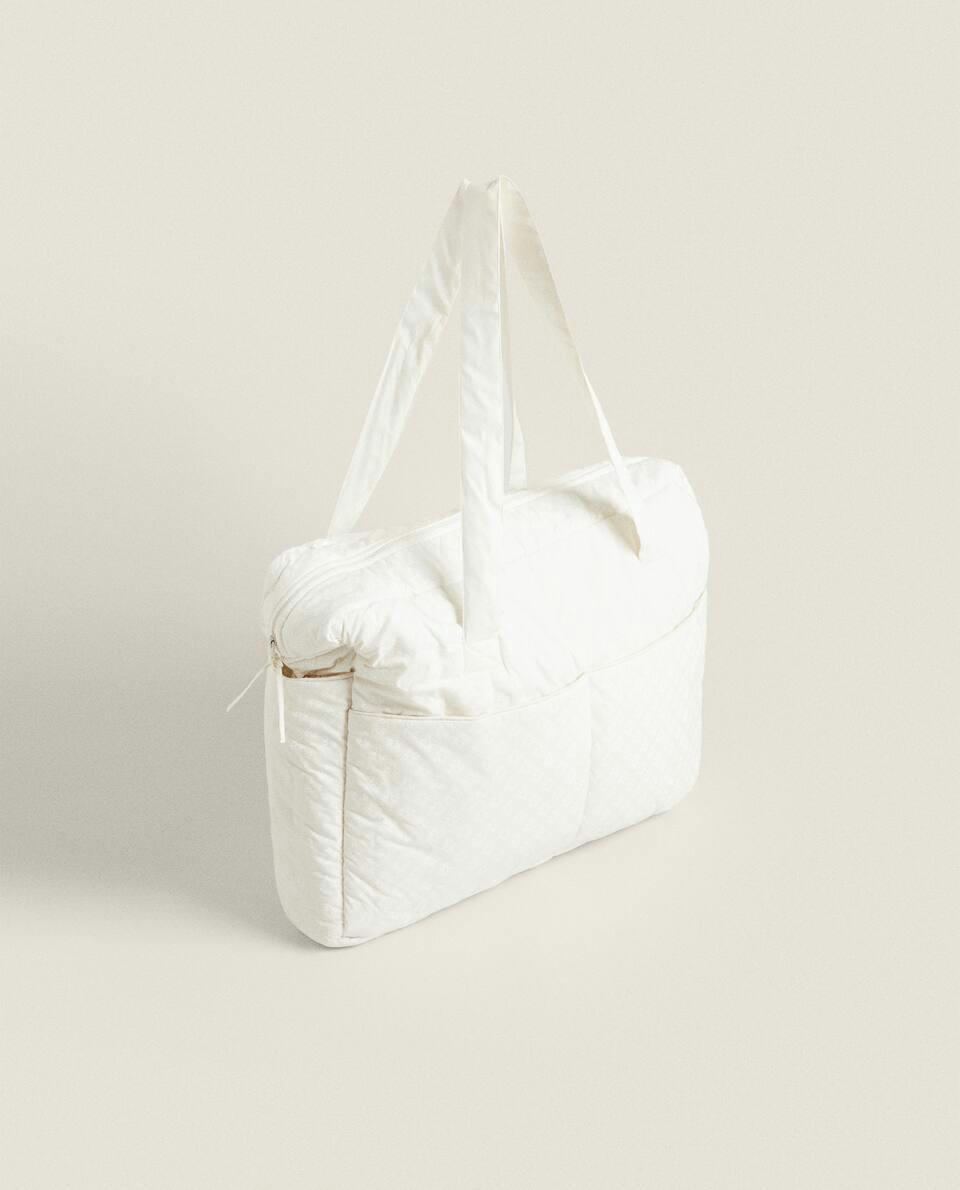 BOLSA DE MATERNIDADE COM ESTAMPA FLORAL