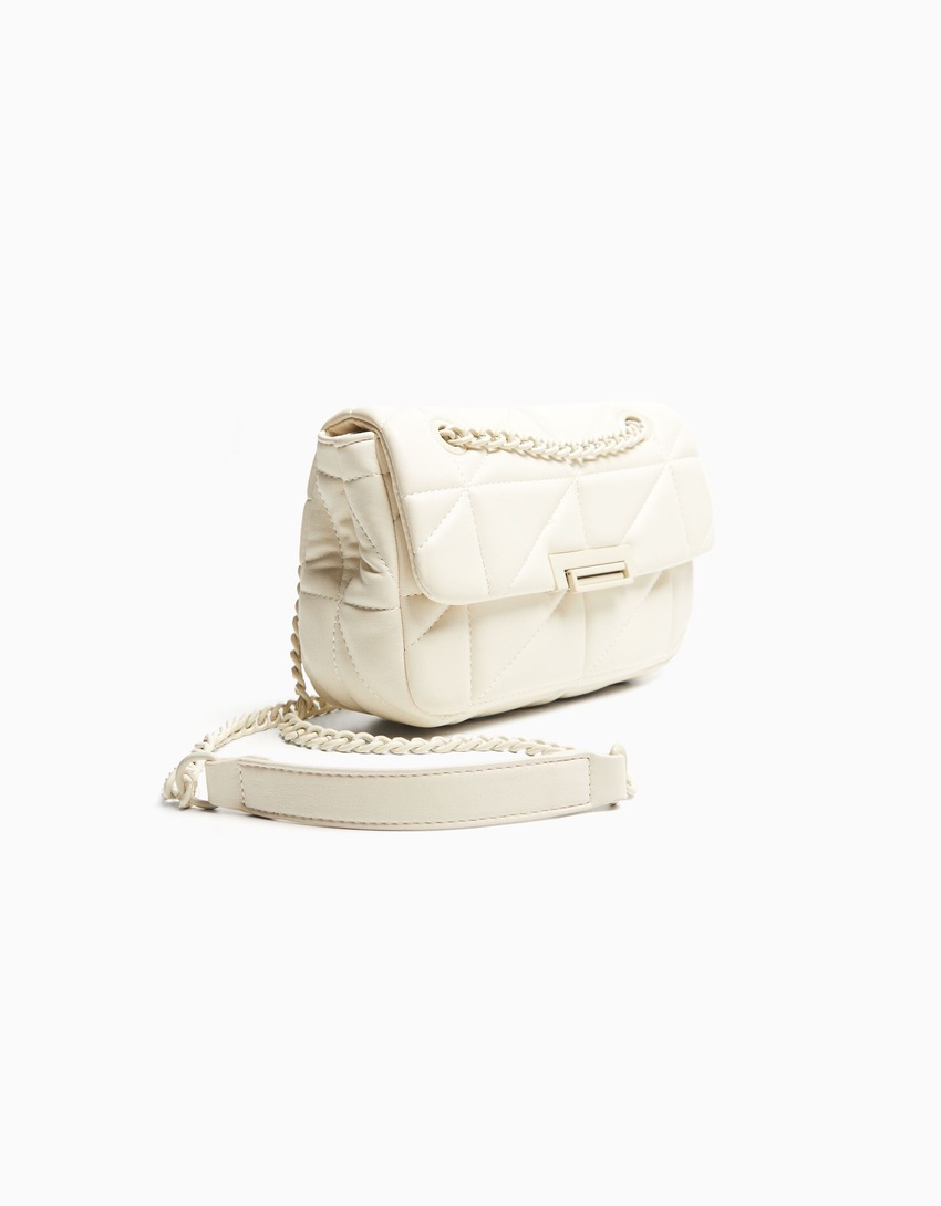 Bolsa transversal multifuncional acolchoada com corrente.