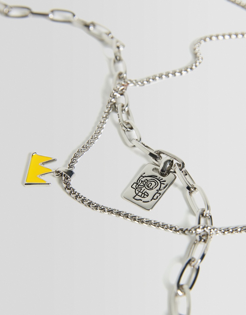 Conjunto de 2 colares com pingentes de Jean-Michel Basquiat