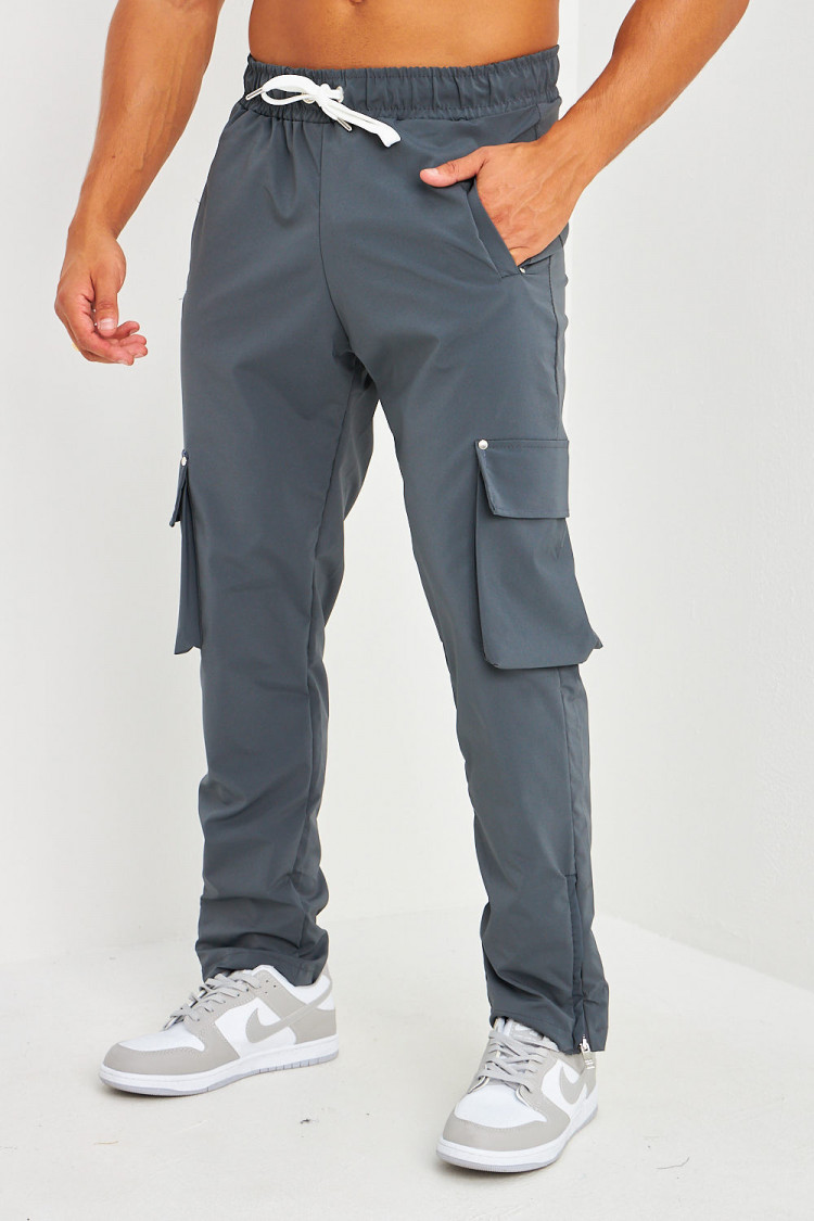 Pantalon de jogging gris anthracite poches cargo et zippé aux chevilles