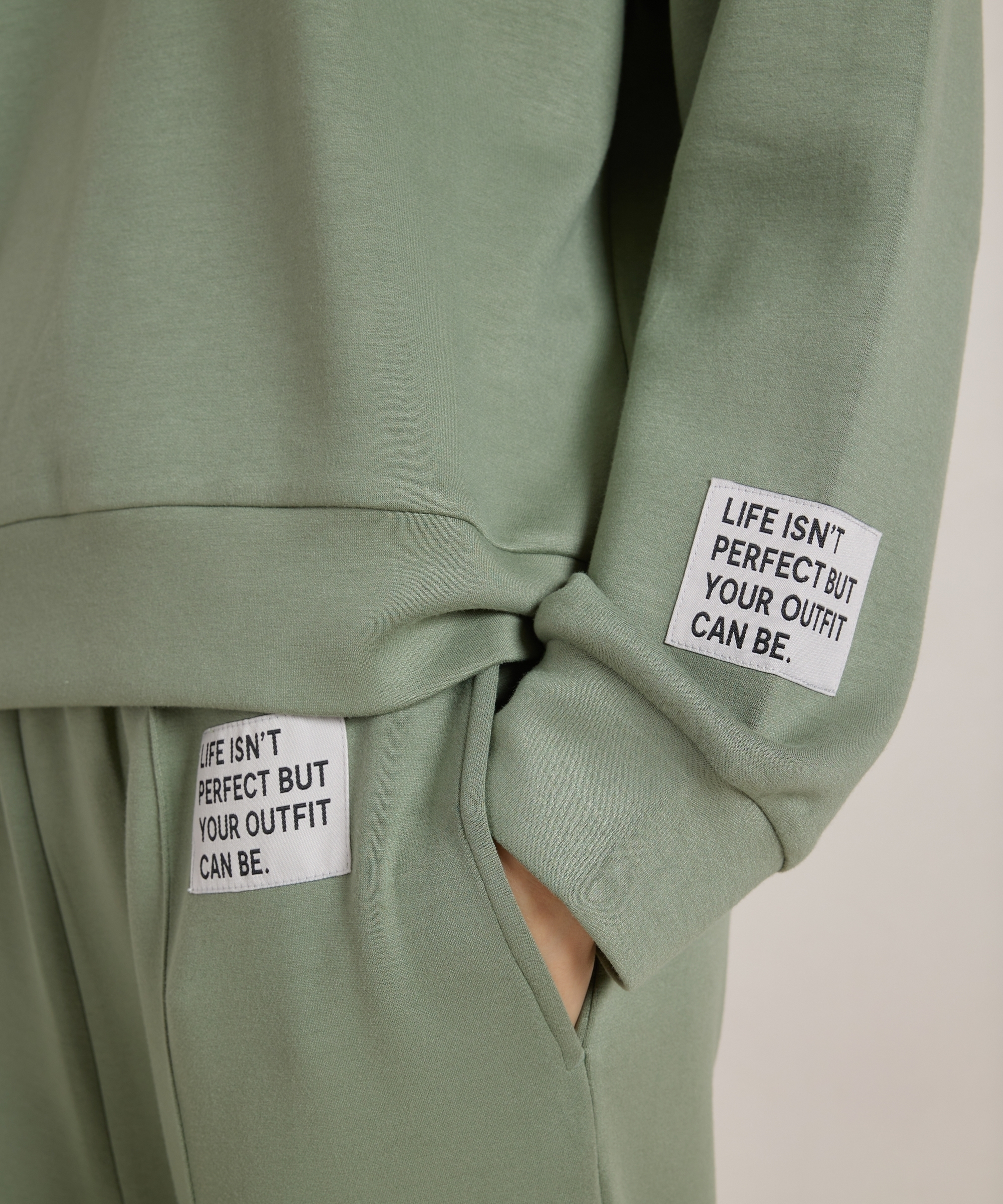 trui met mouwlabel