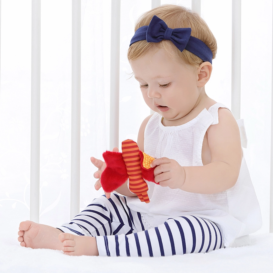 sigikid® Greifring Knister-Schmetterling orange Red Stars Collection