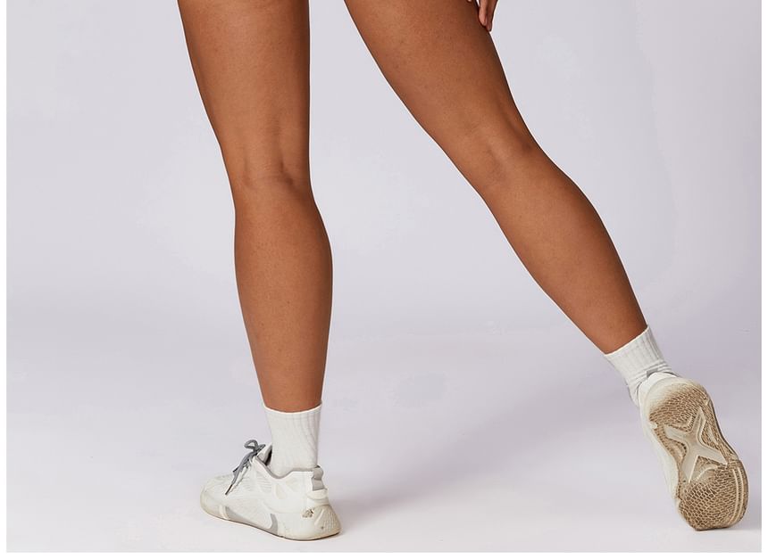 Skinniano - Spaghettibandjes effen open rug sportromper