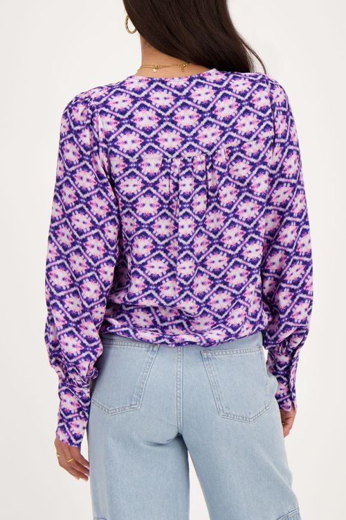 Blauwe blouse met roze print