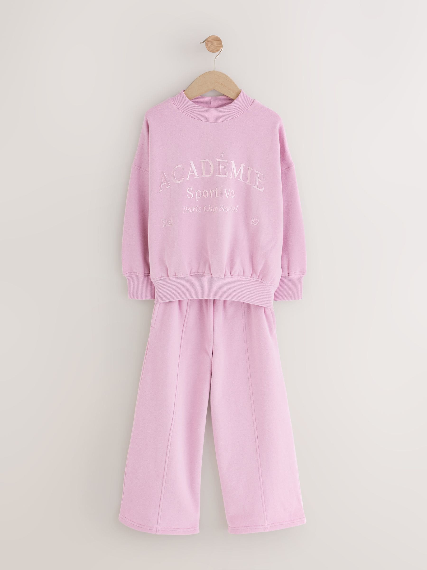 Roze met slogan - Set van sweatshirt en joggingbroek met wijde pijpen (3-16jr)