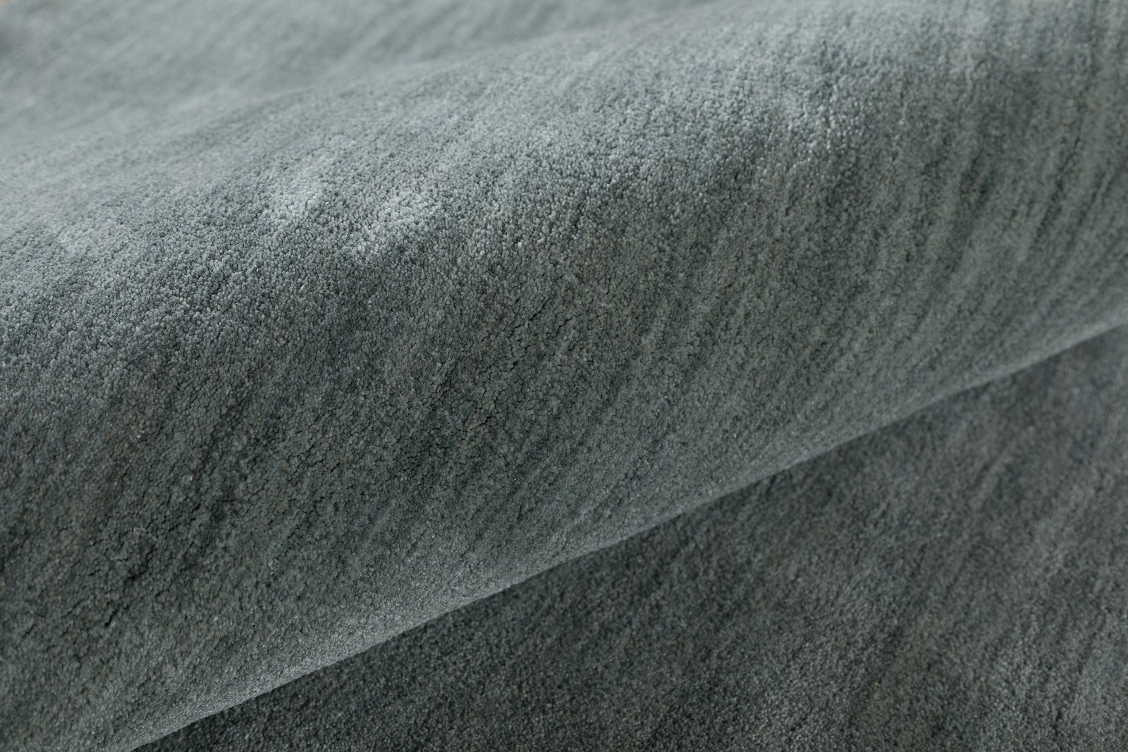 Wilston gulvteppe 200x290 200x290 cm. Grønnfarget polyester håndtuftet.