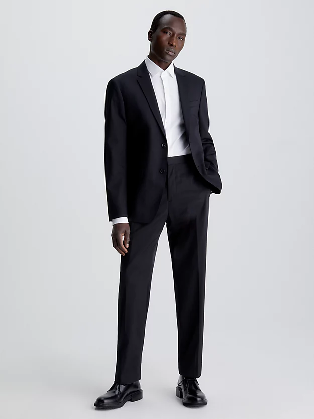 Blazer de abotoamento simples em lã elástica com modelagem slim.