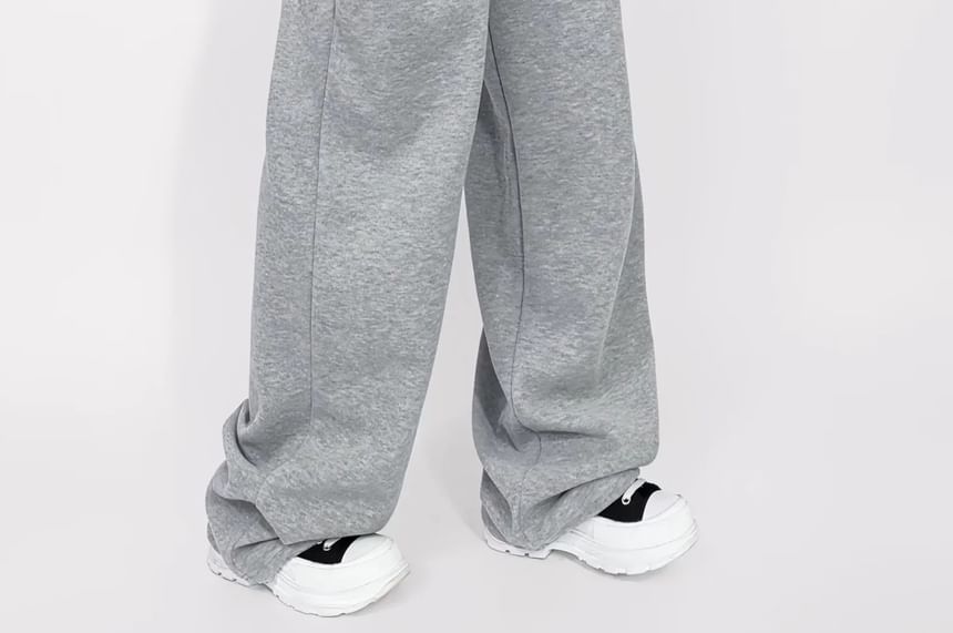 Asiris - Lage, contrasterende, losse joggingbroek met wijde pijpen