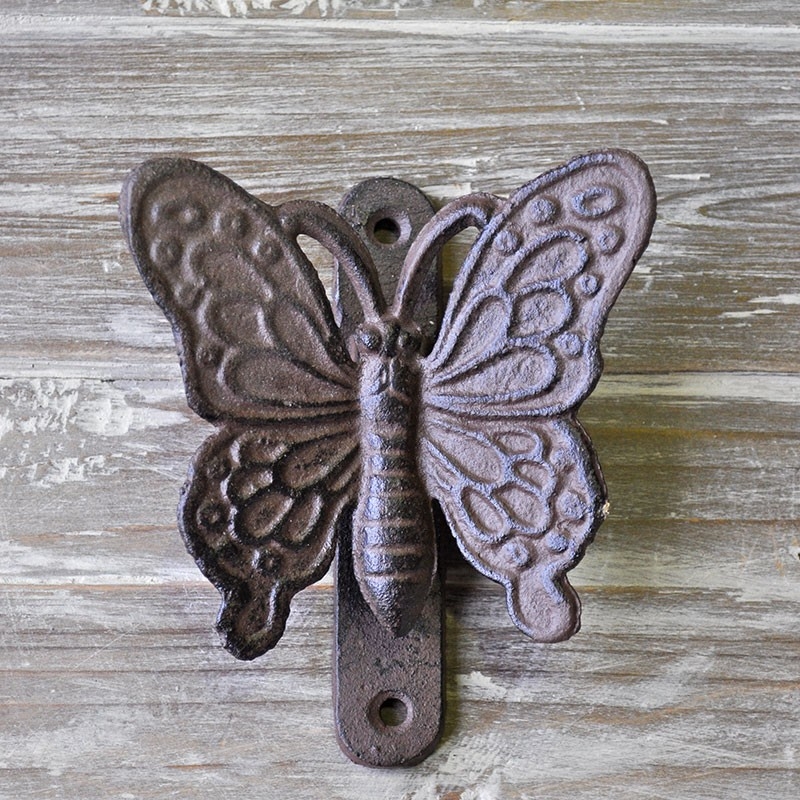 Heurtoir porte fonte papillon 12x10x4cm