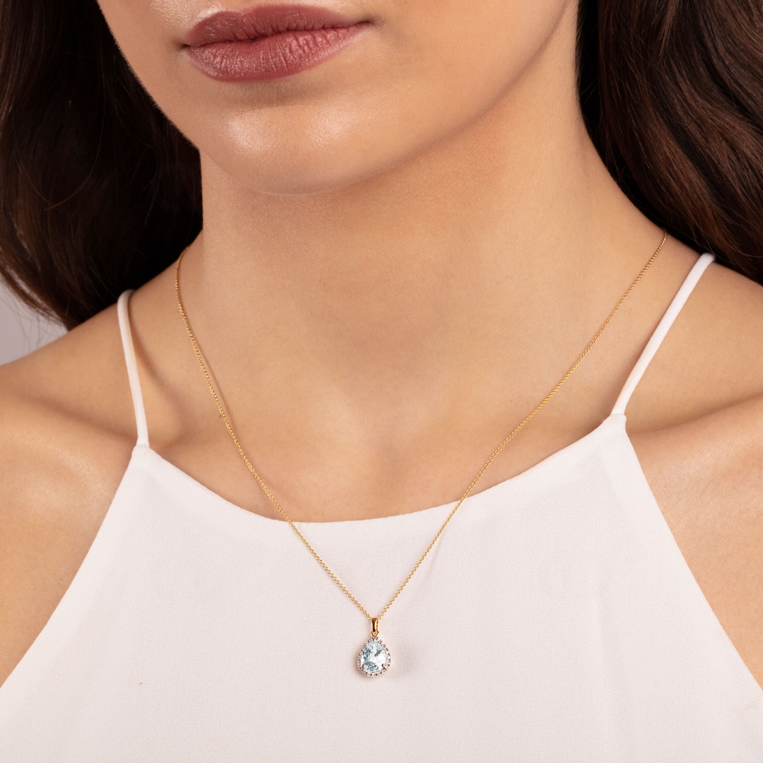 Anhänger 750/18 K Gelbgold mit grünem Amethyst Tropfen und Diamanten 0.06 ct H/si