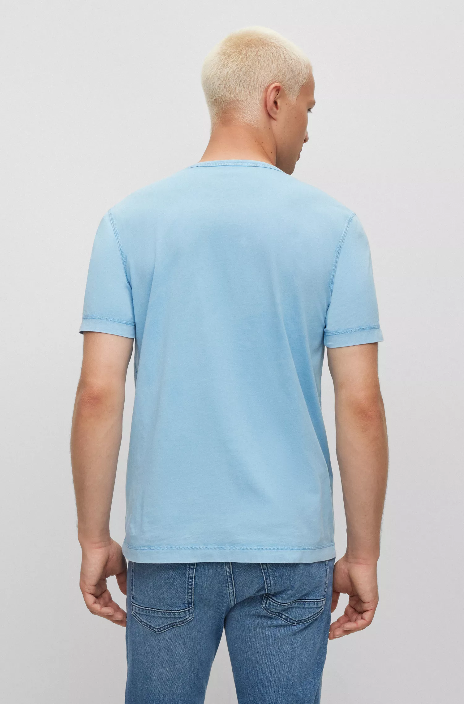 Camiseta BOSS laranja em malha de algodão com efeito desbotado pelo sol.
