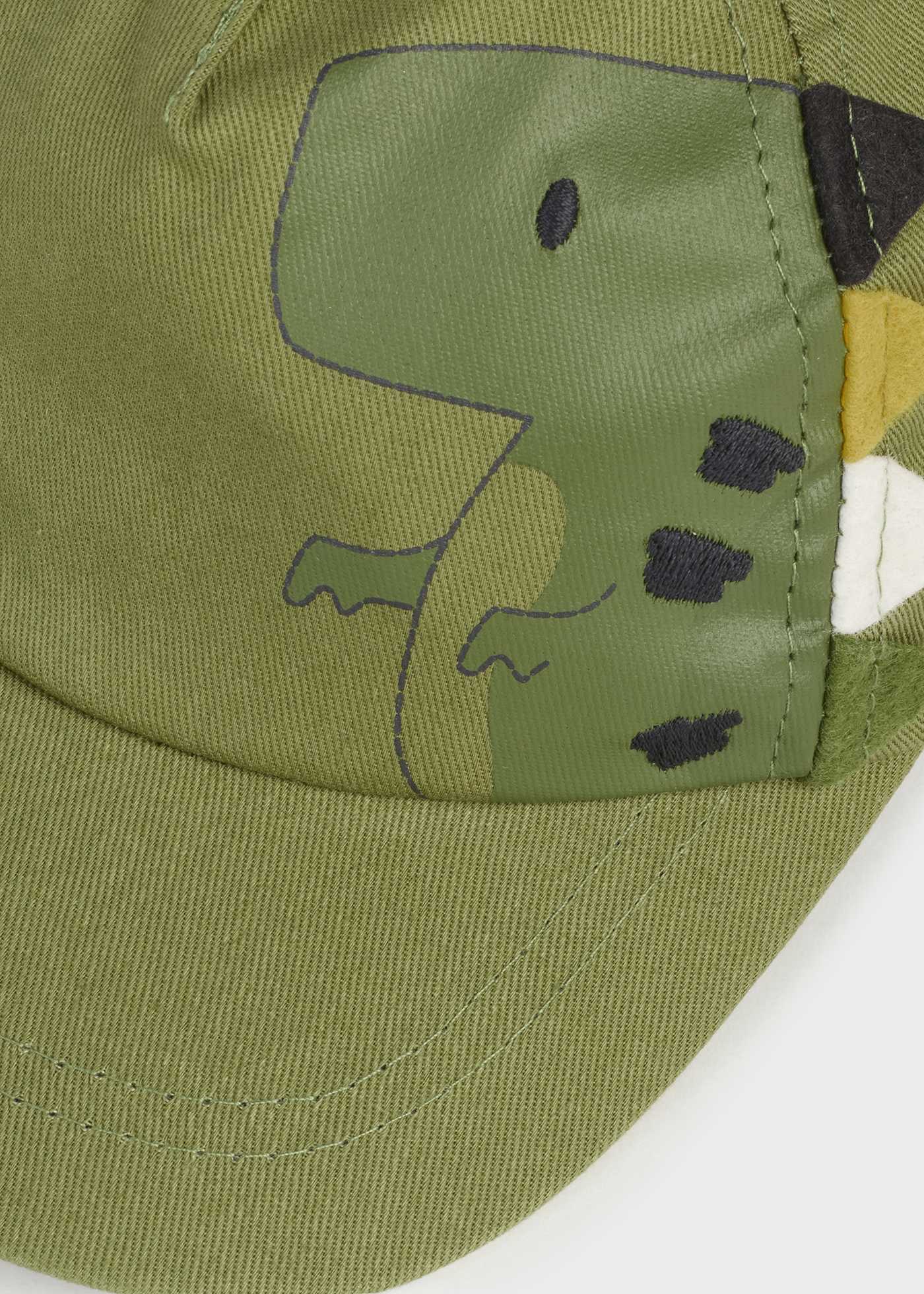 Touca infantil com estampa, feita de algodão sustentável.