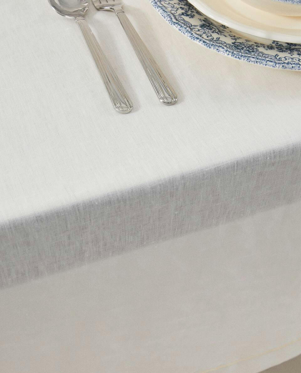 TOALHA DE MESA DE LINHO COM DETALHE EM VIÉS
