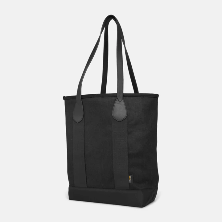 Bolsa tote feminina em lona e couro na cor preta.