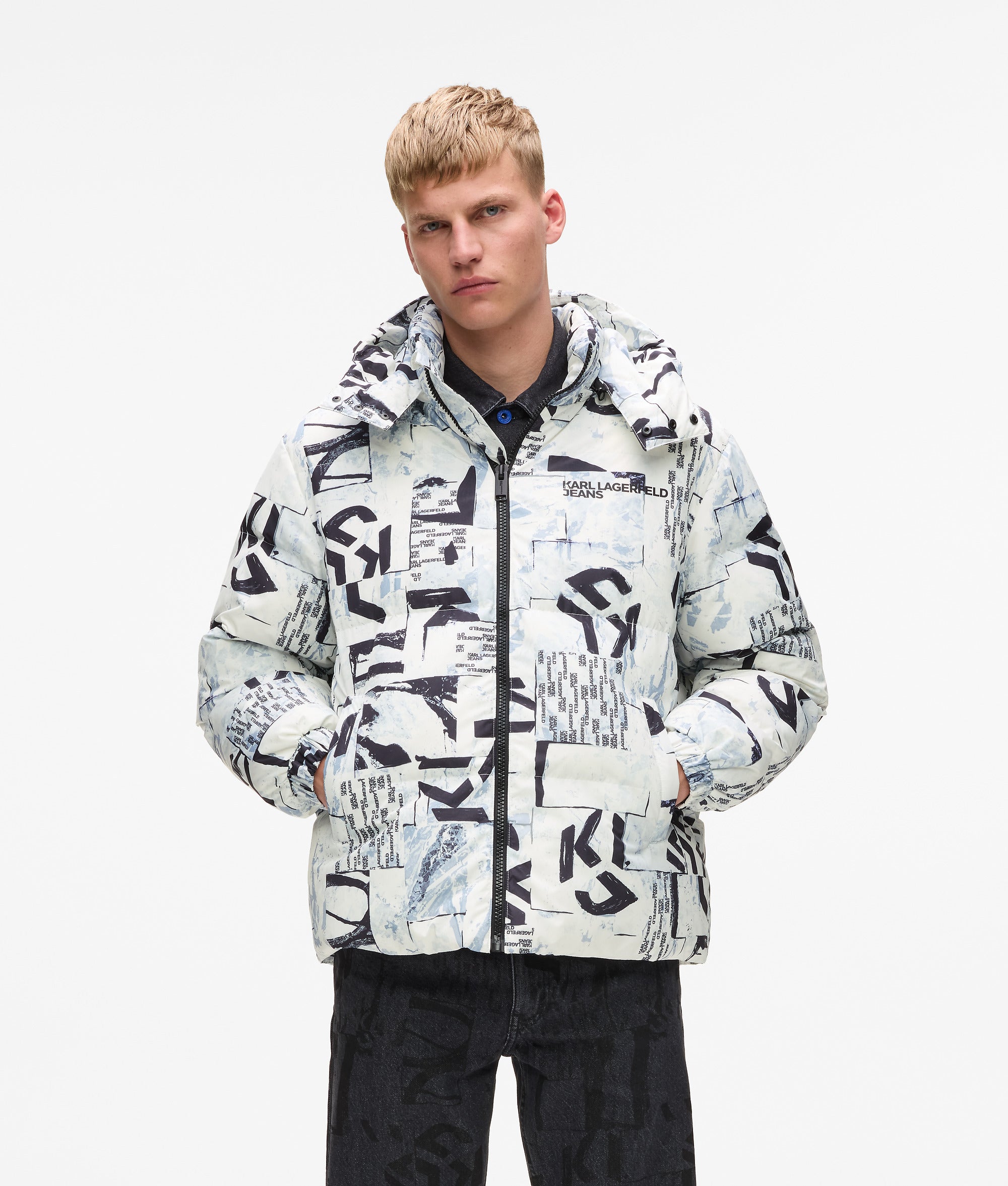 Pufferjack met Monogram over de hele jas