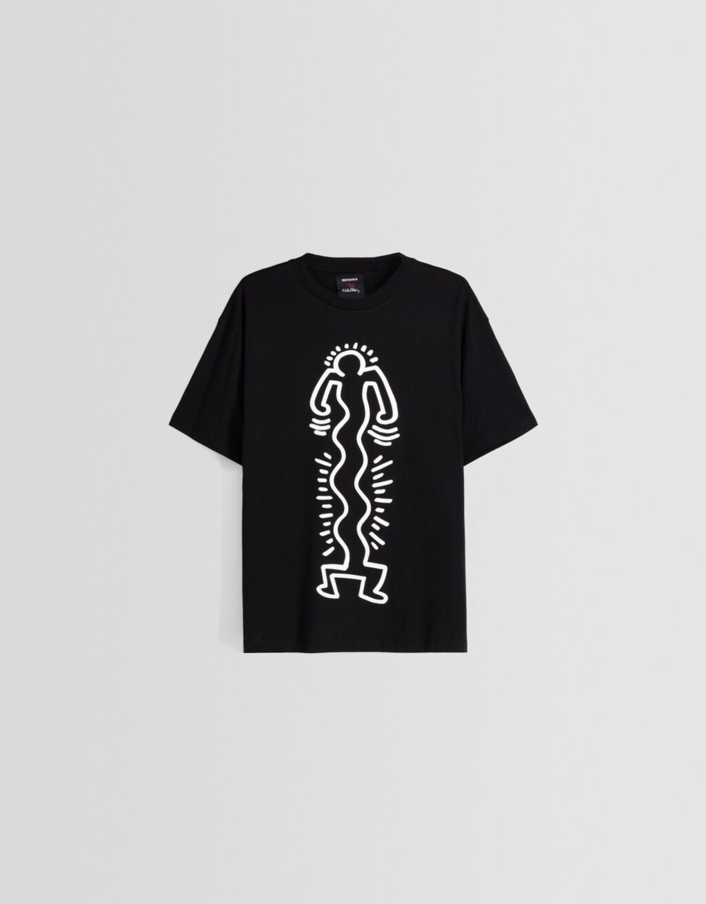 Camiseta de manga curta com estampa Keith Haring e modelagem quadrada.