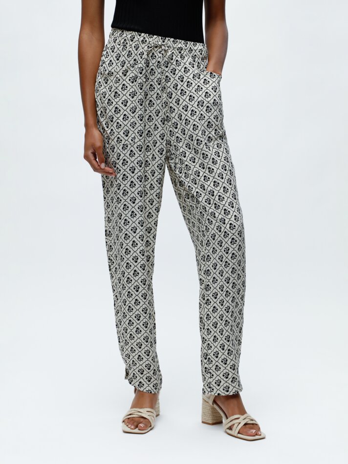 Calças fluidas estampadas - Cru claro