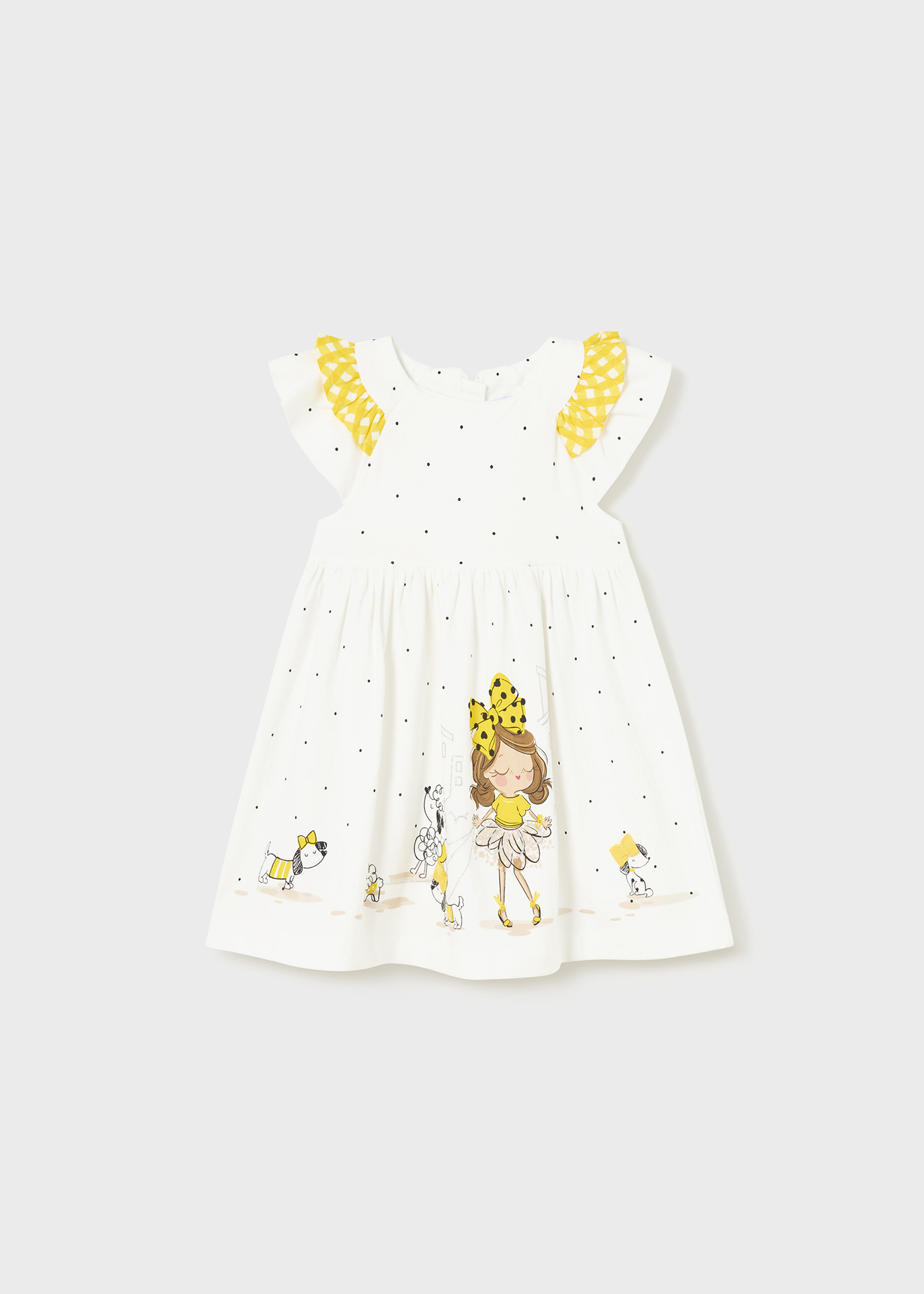 Vestido infantil com estampa feita de algodão sustentável.