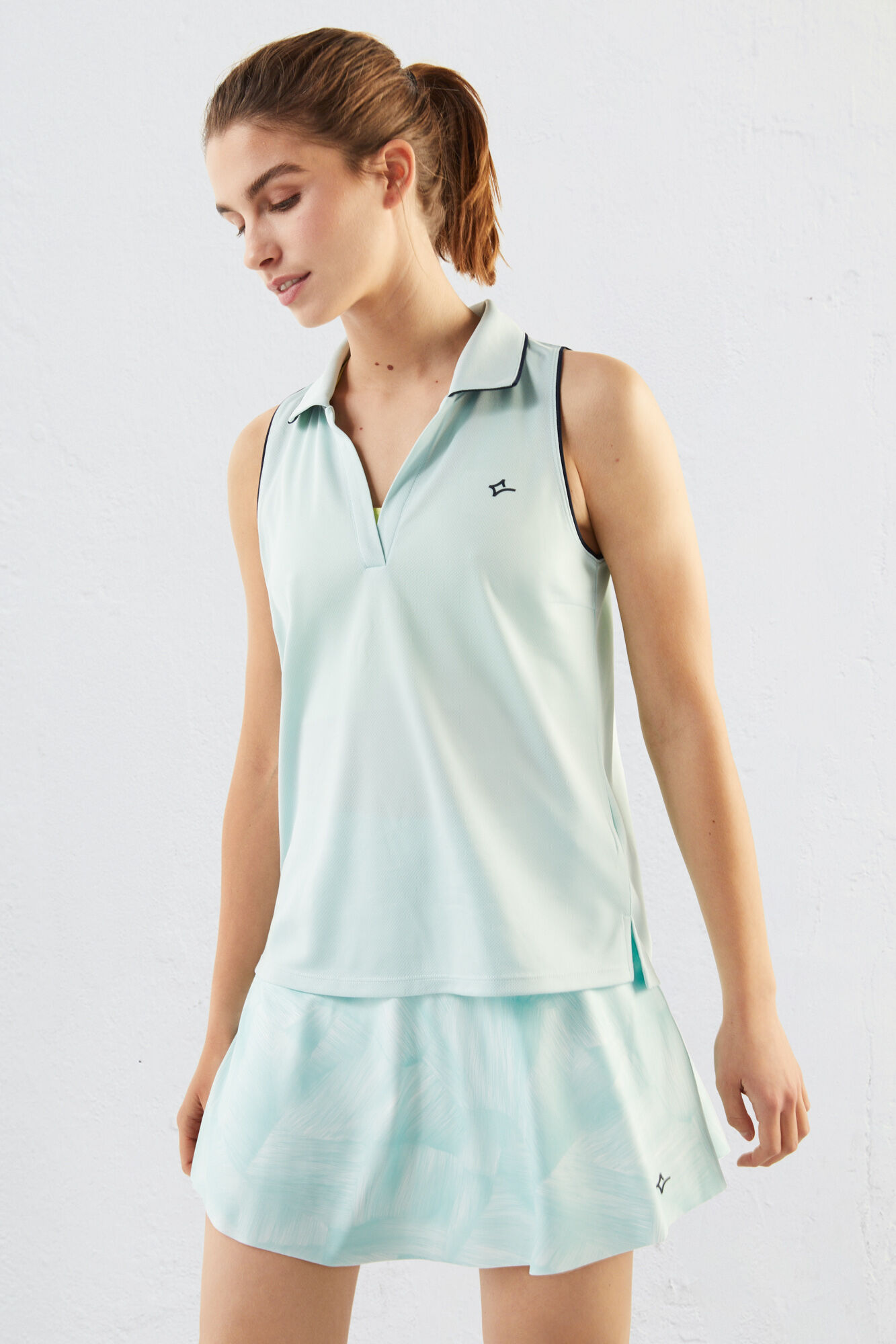 Camisa polo sem mangas verde-água