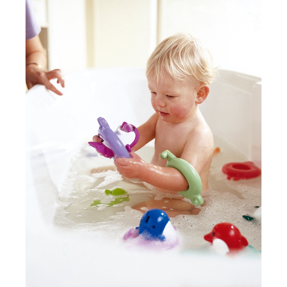 TOMY Toomies Do Re Mi Delfine Badespielzeug