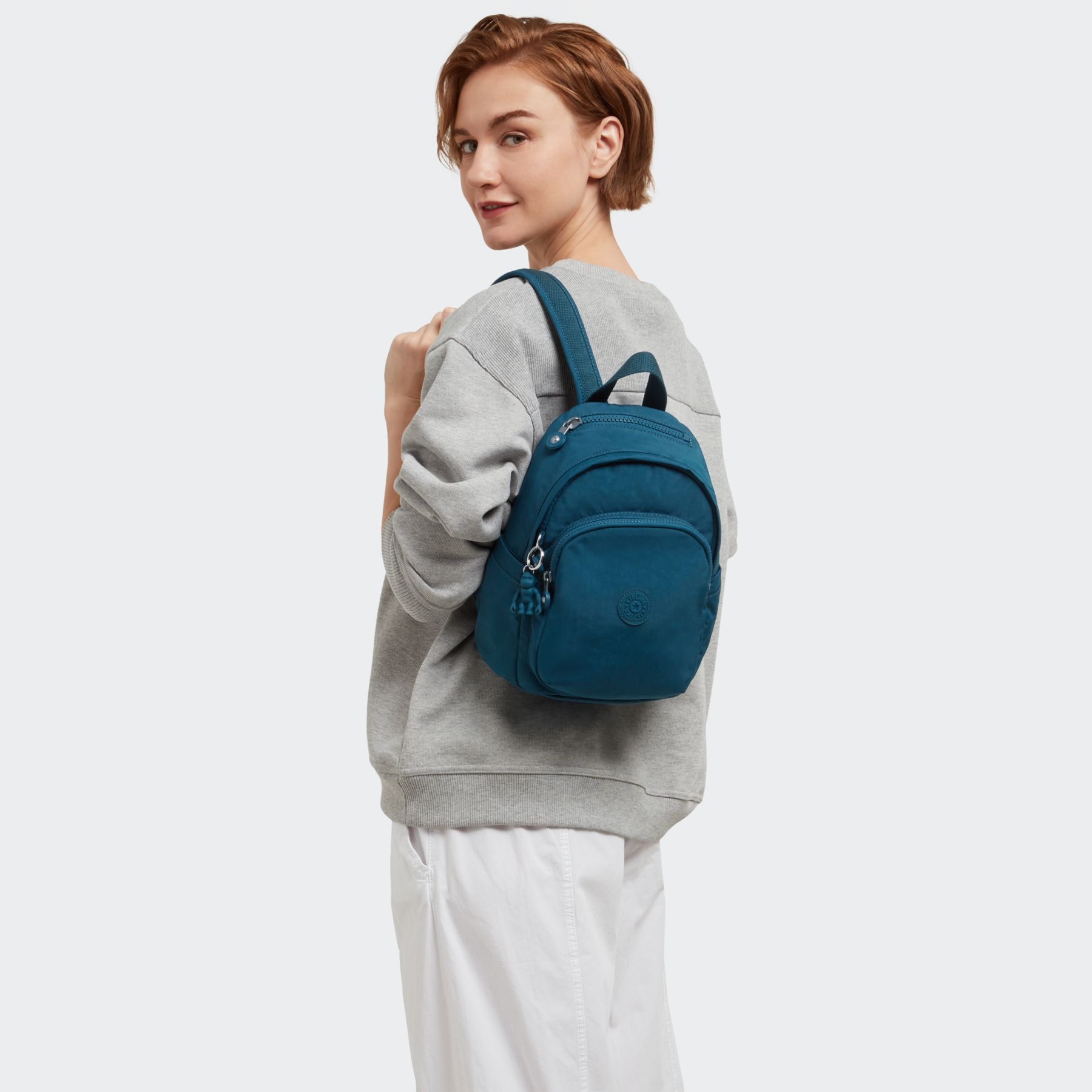 DELIA MINI Petit Sac à Dos avec Poche Frontale et Poignée Supérieure - Cosmic Emerald