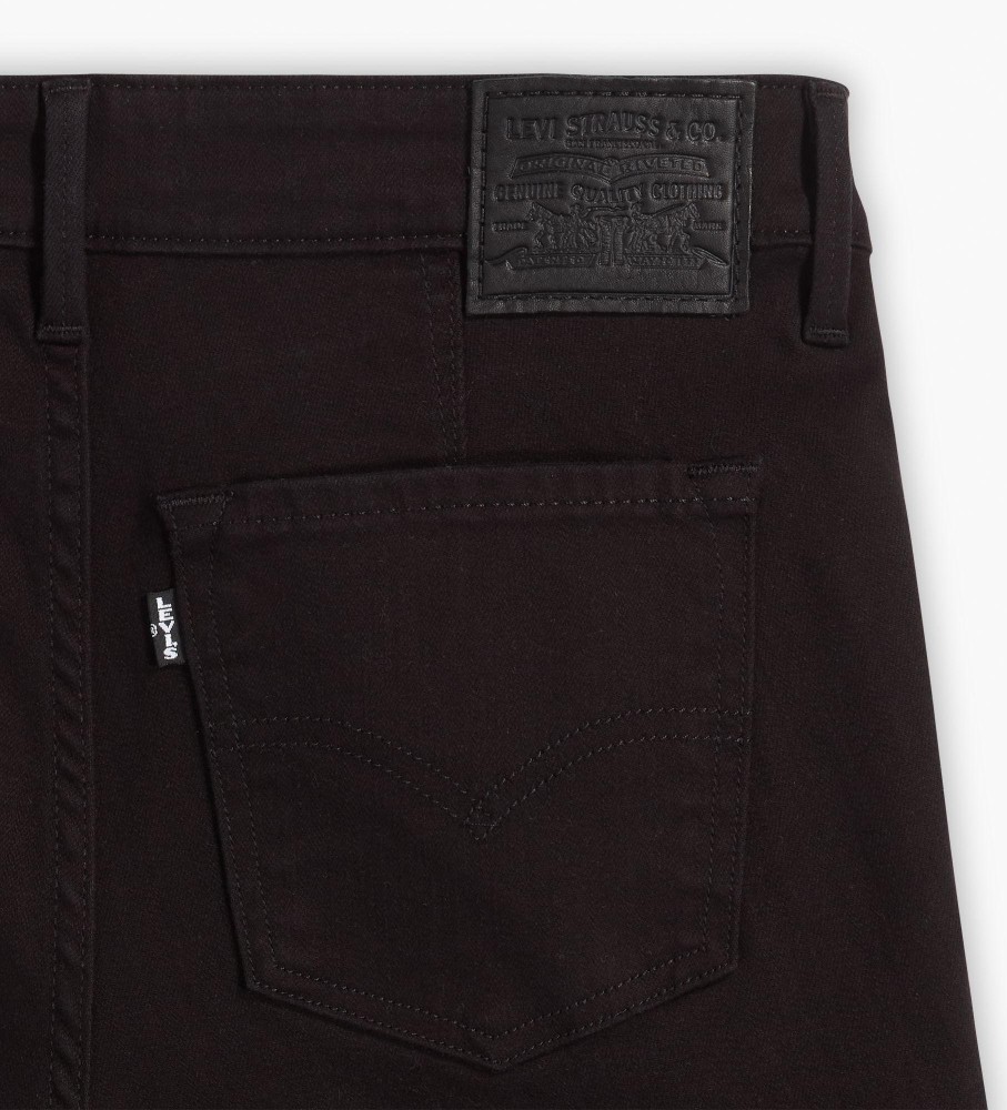 Calça jeans Levi's 712 com bolso embutido, corte slim, preta.