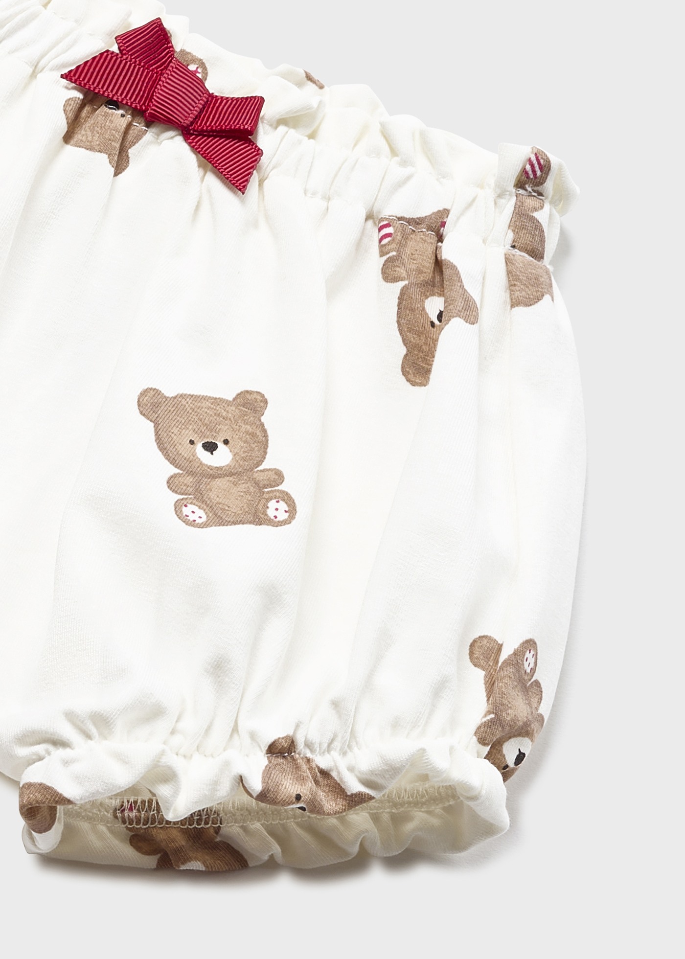 Conjunto de 4 peças em algodão sustentável para recém-nascidos.