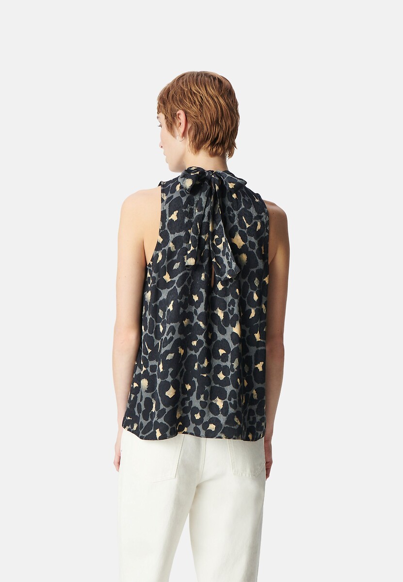 Blusa sem mangas IKKS com gola alta e estampa gráfica.