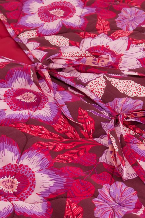 Bruin gewatteerd jasje met strikjes en roze bloemenprint