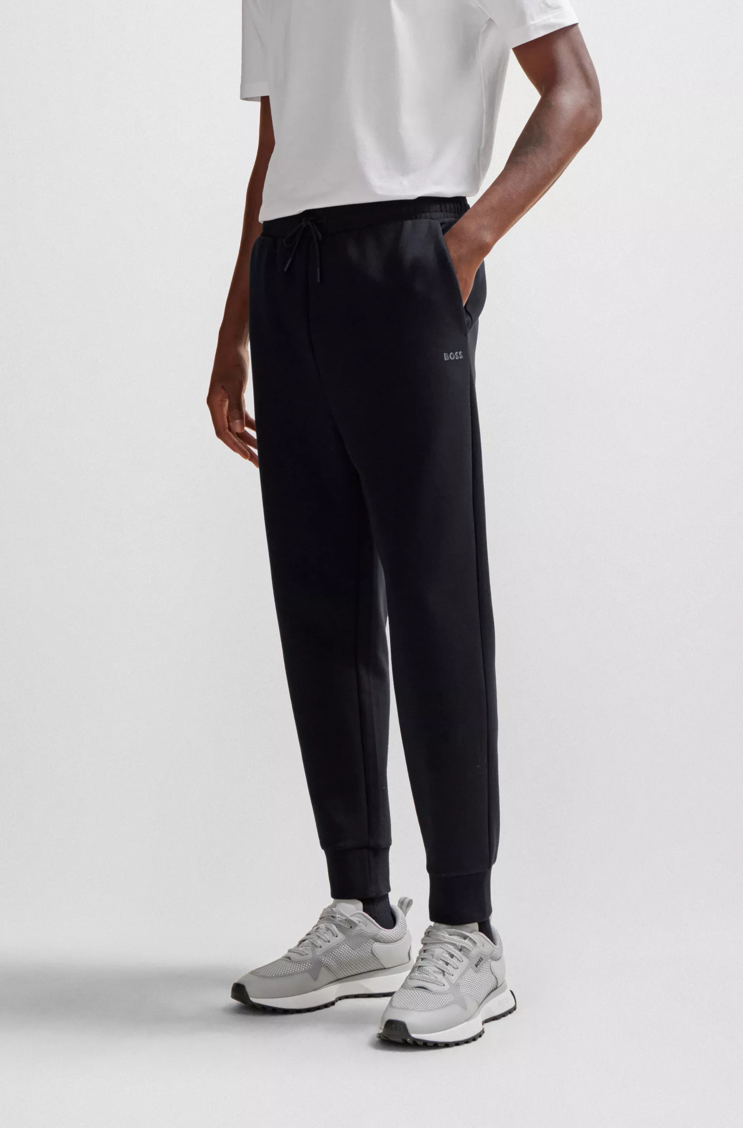 Calça de fato de treino BOSS verde em algodão elástico com estampa do logótipo