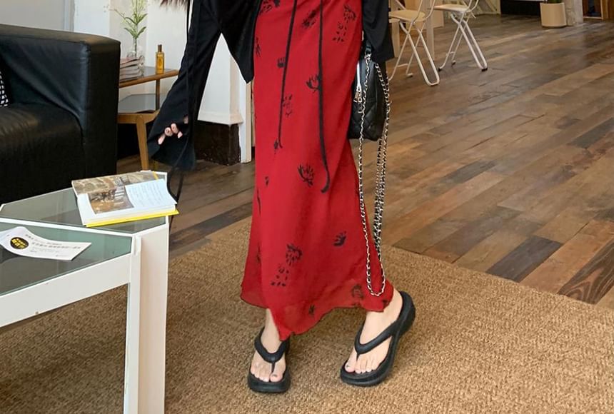 Ashlee - Mouwloze V-hals maxi-zonnejurk met bloemenprint / Effen vest met vetersluiting
