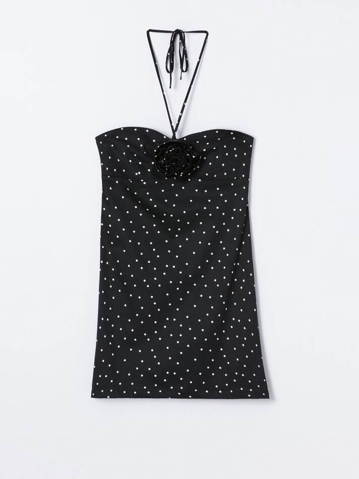 Vestido com estampa de bolinhas e detalhe floral - Preto