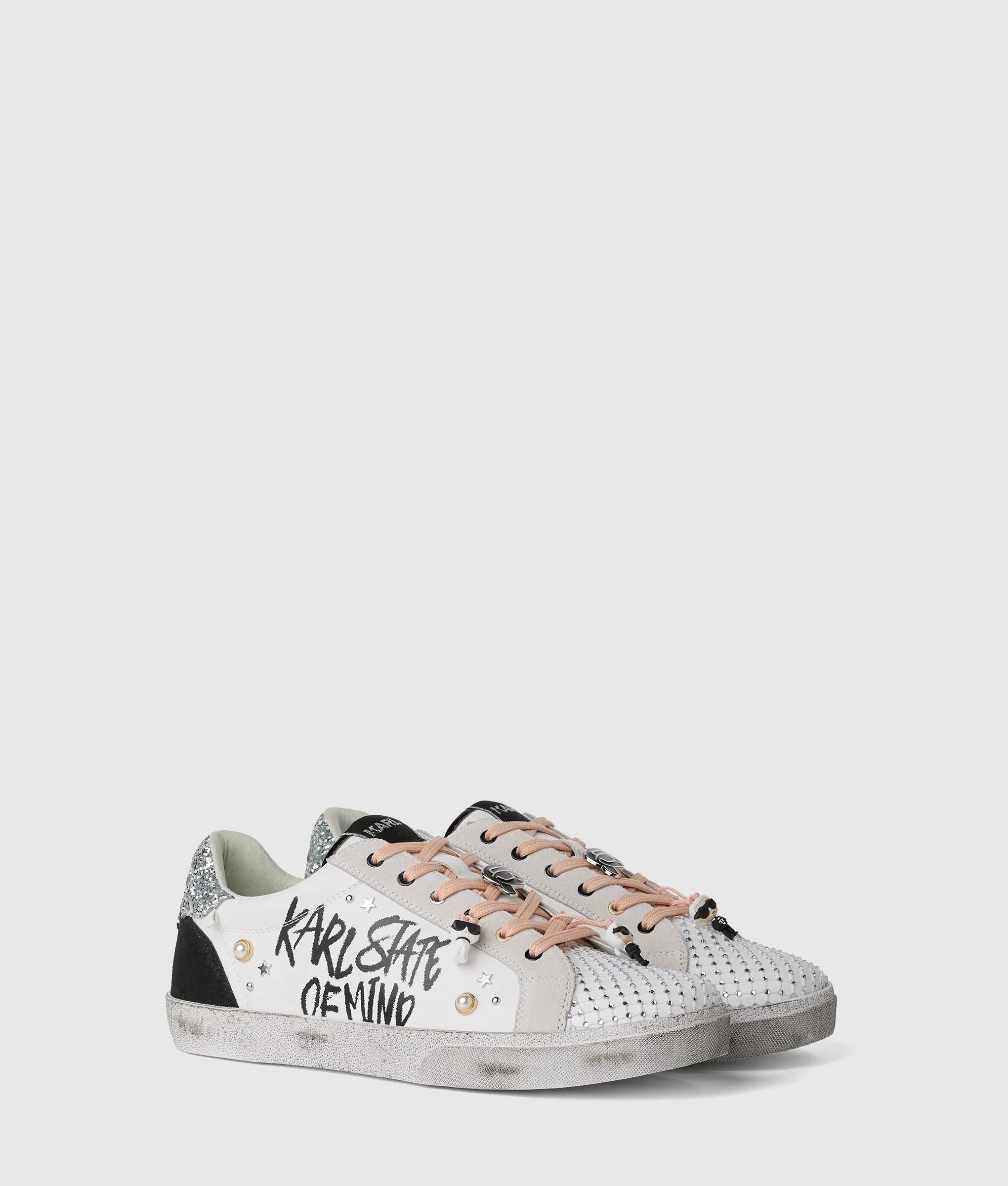 Skool Karl quote sneakers met studs