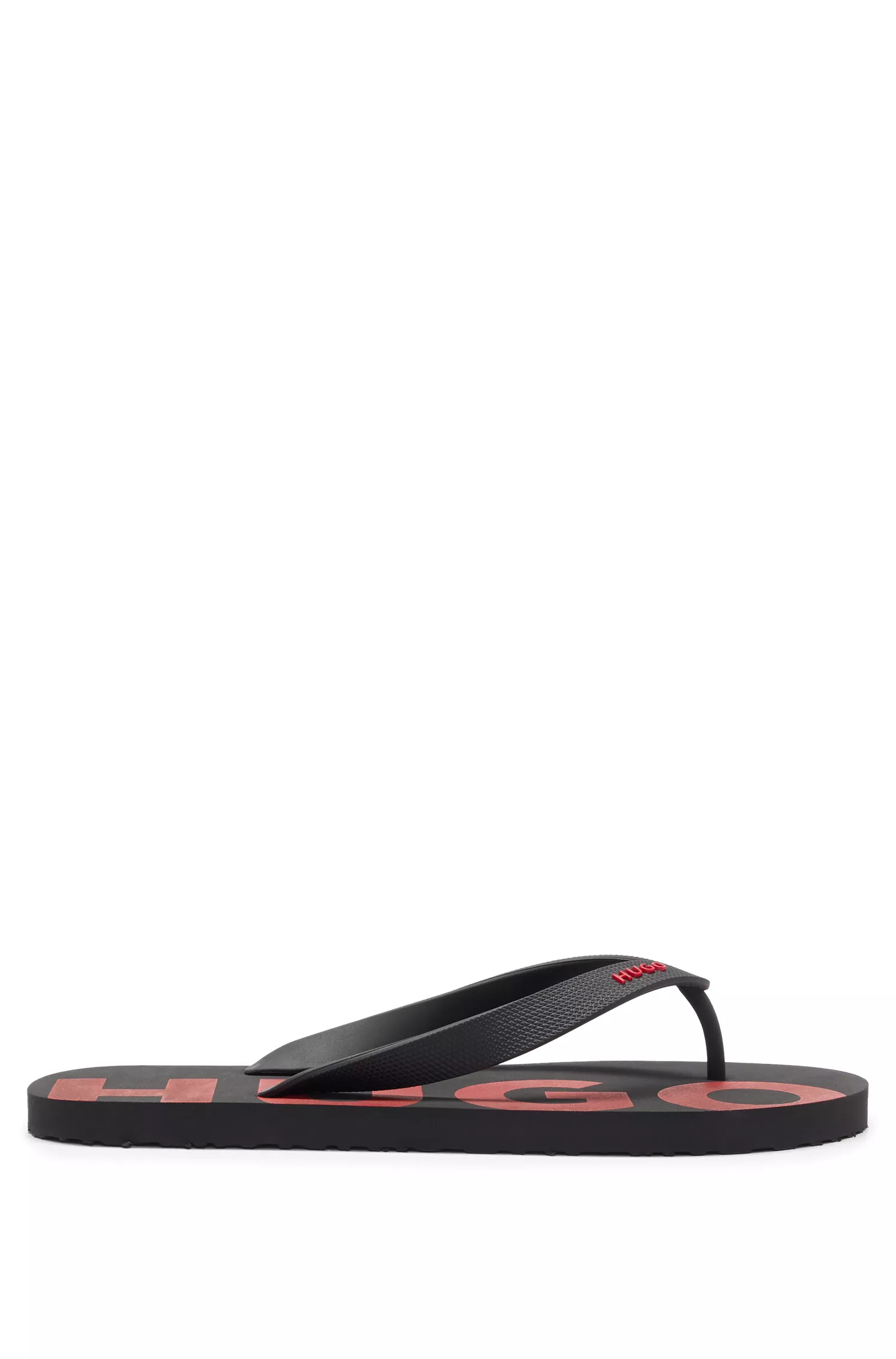 Chinelo HUGO com tira vermelha com logo e palmilha personalizada.