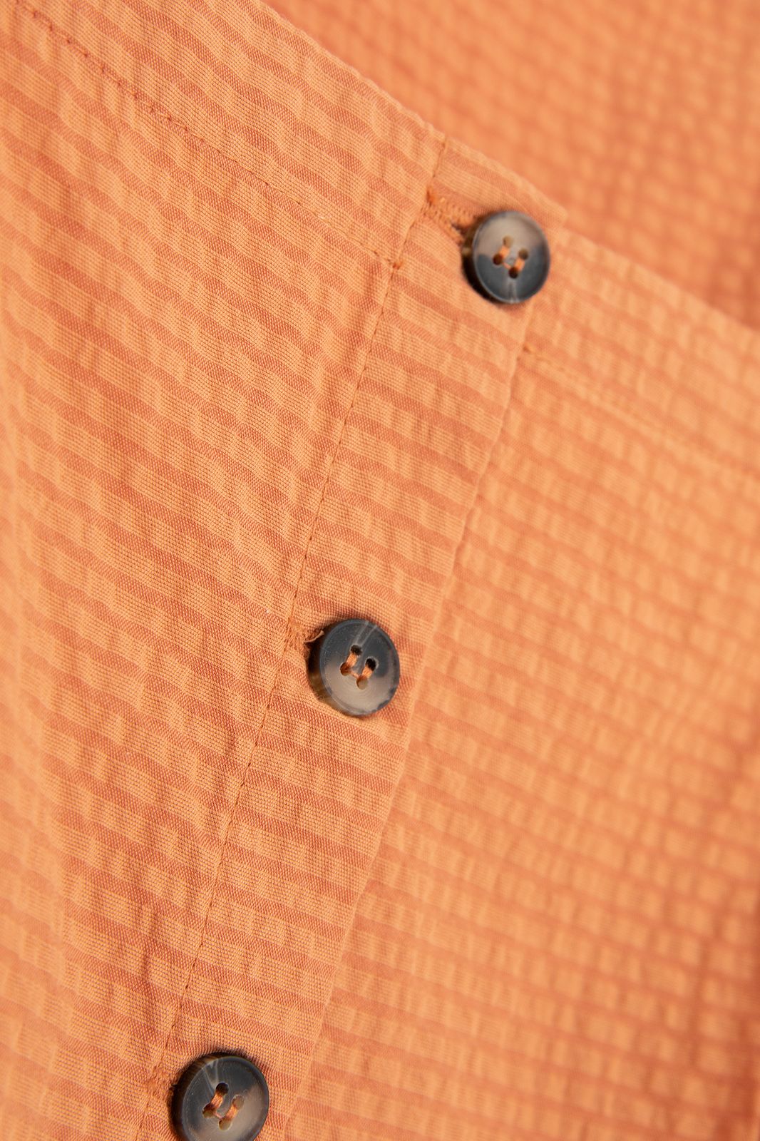 Oranje blouse met pofmouwen