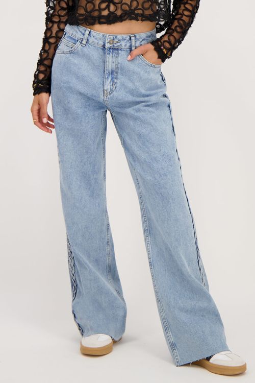 Blauwe jeans met vlecht detail