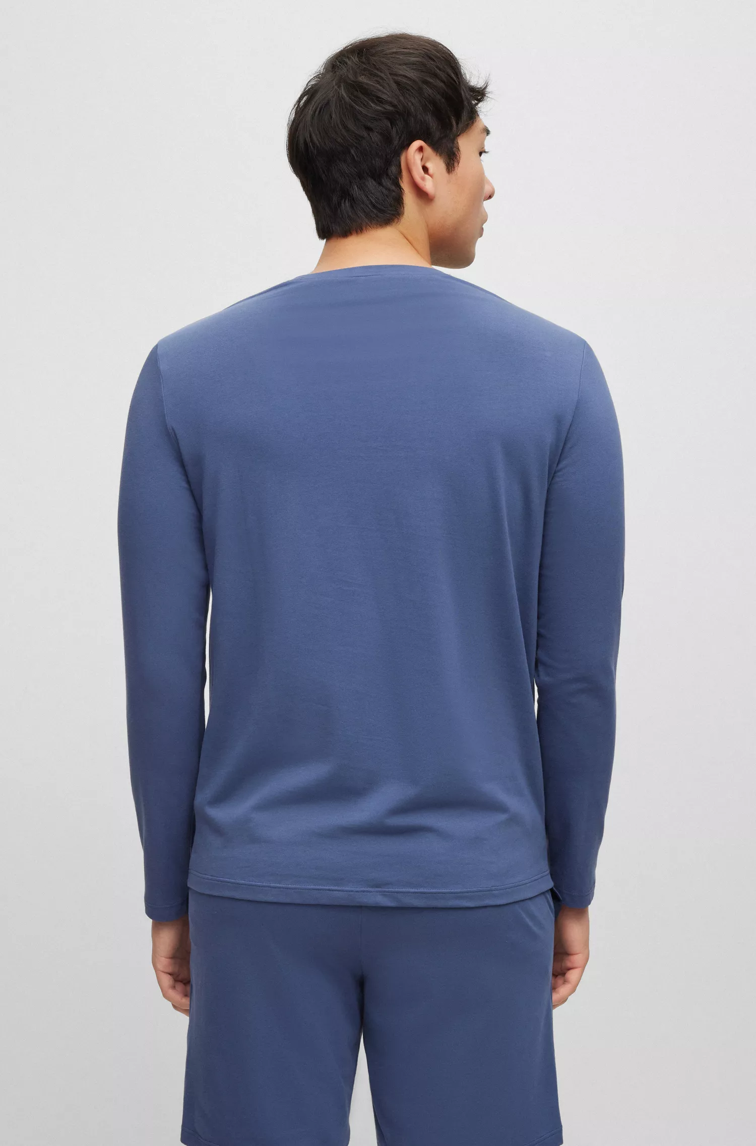 Camiseta de descanso BOSS com logo preto bordado, em malha de algodão stretch.