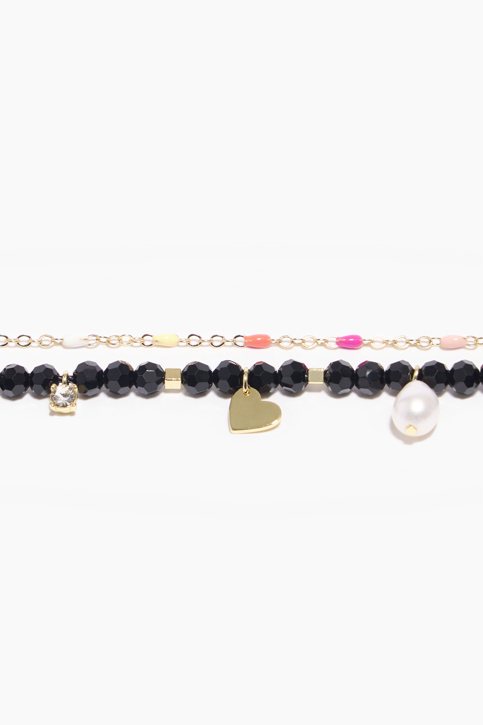 Pulseira com cristais facetados e corrente dourada.