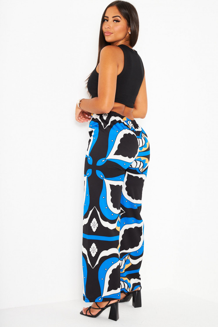 Pantalon bleu large et baroque